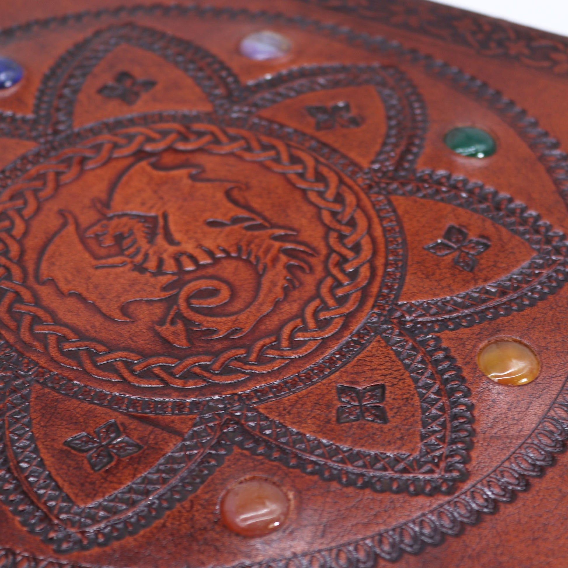 Extra large, rich brown leather journal, 25x34cm size, featuring deeply embossed artwork of a coiled dragon at the center of a lotus-style mandala.