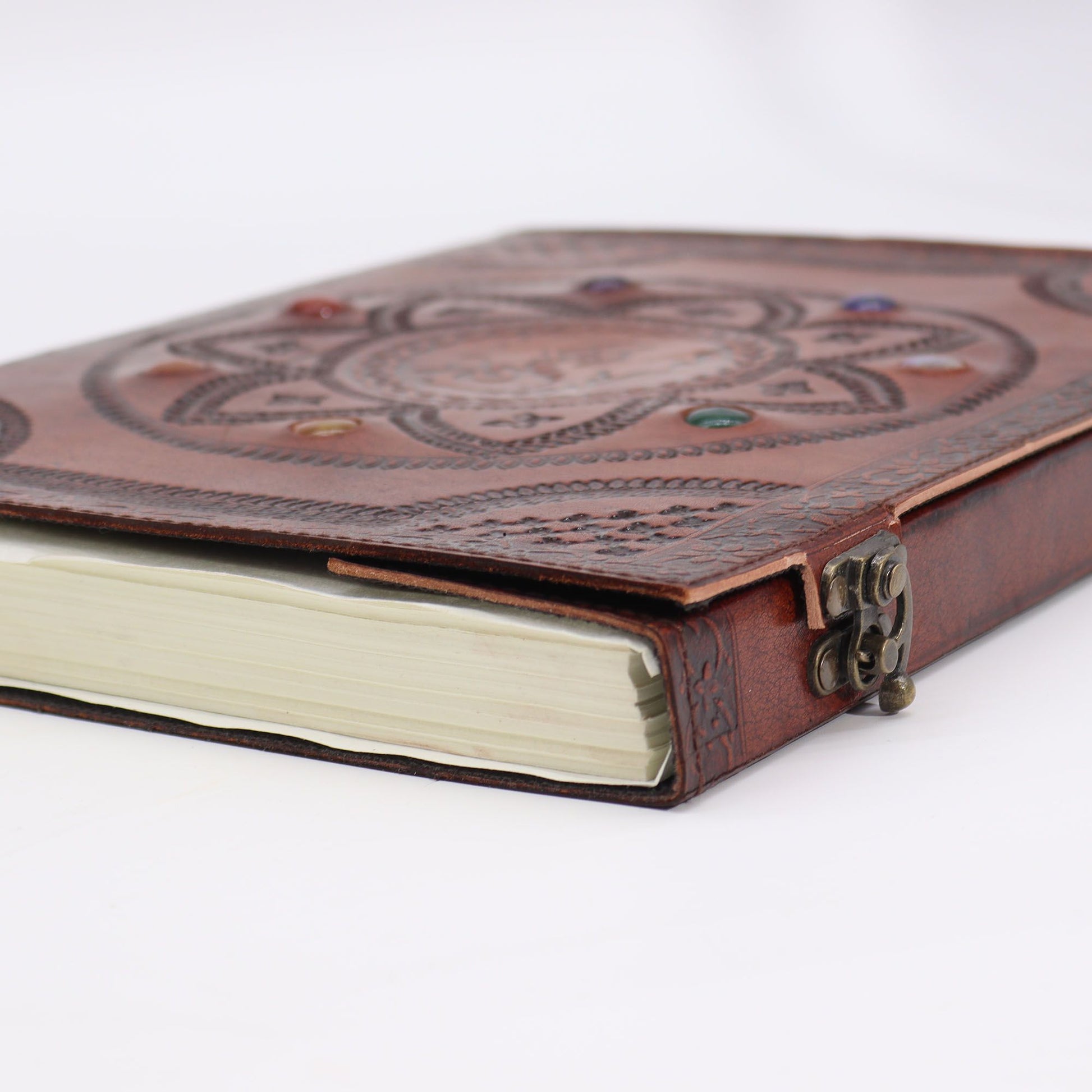 Handmade 'Tomb Book' with seven natural Chakra gemstones embedded into the leather cover design, ideal for a spiritual Book of Shadows or grimoire.